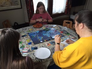 Friends and fam playing Pandemic, 